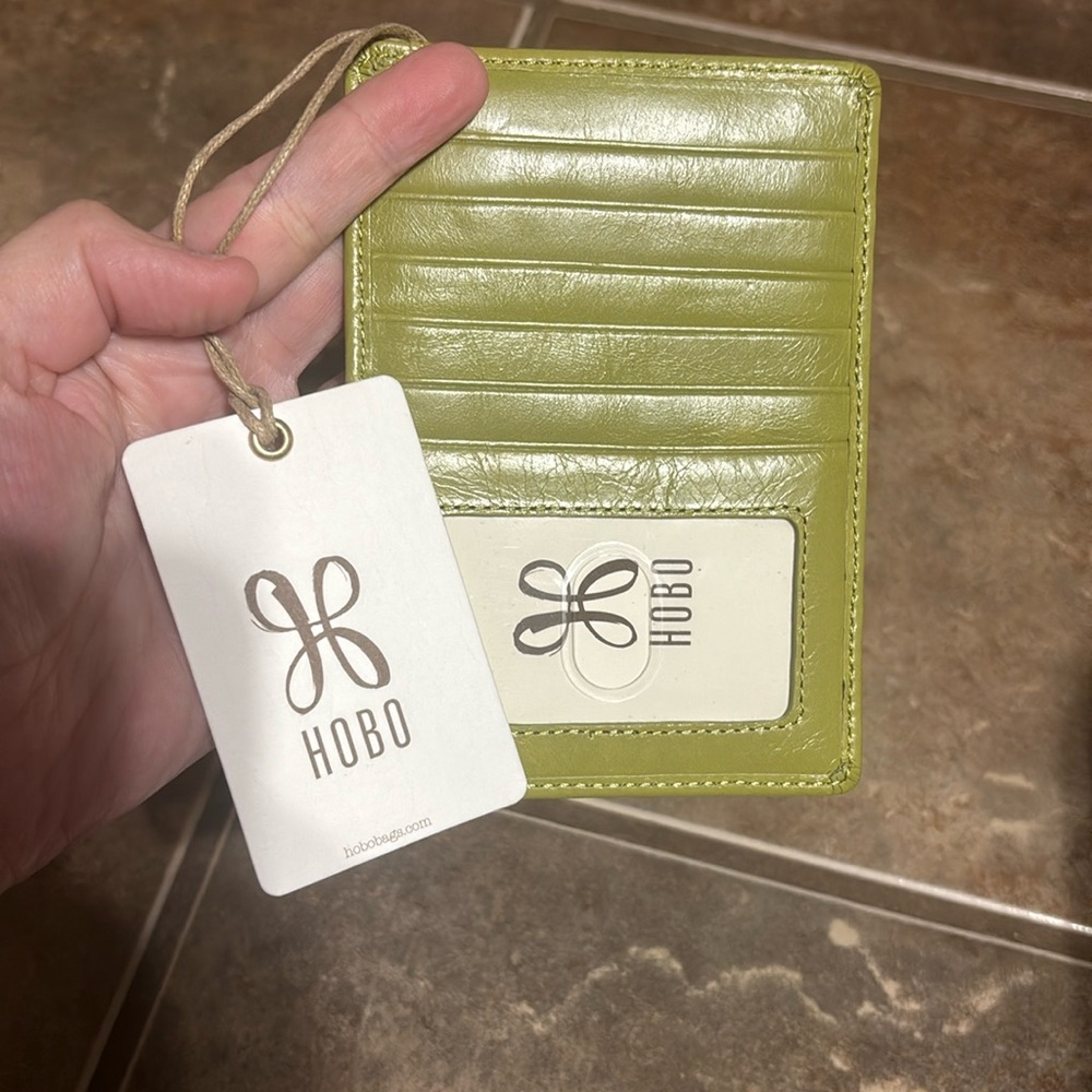 Hobo Euro slide wallet in dark citron leather